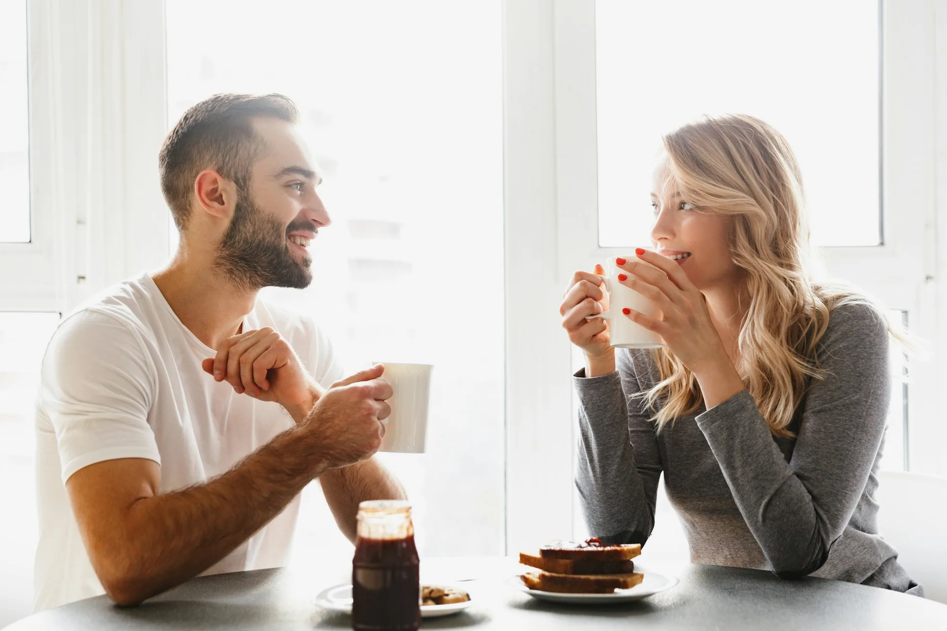 A couple sitting together in conversation during a therapy session